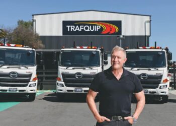 Trafquip Managing Director, Jeff
Trim, has taken delivery of more than 100 Hino trucks for the traffic equipment rental business. Image: Hino Australia.