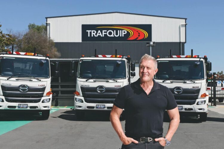 Trafquip Managing Director, Jeff
Trim, has taken delivery of more than 100 Hino trucks for the traffic equipment rental business. Image: Hino Australia.